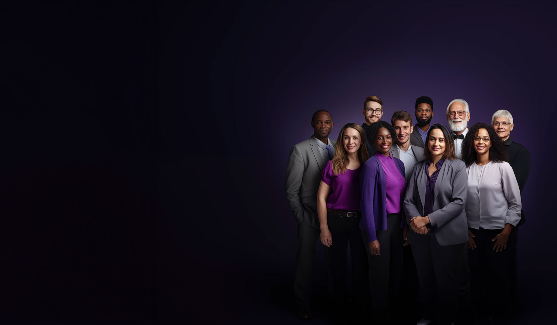 A group of 10 people stands together, dressed in business attire, with a dark purple background, smiling and facing the camera.